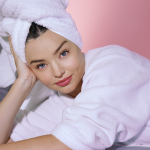 Miranda Kerr in robe and with towel on her head
