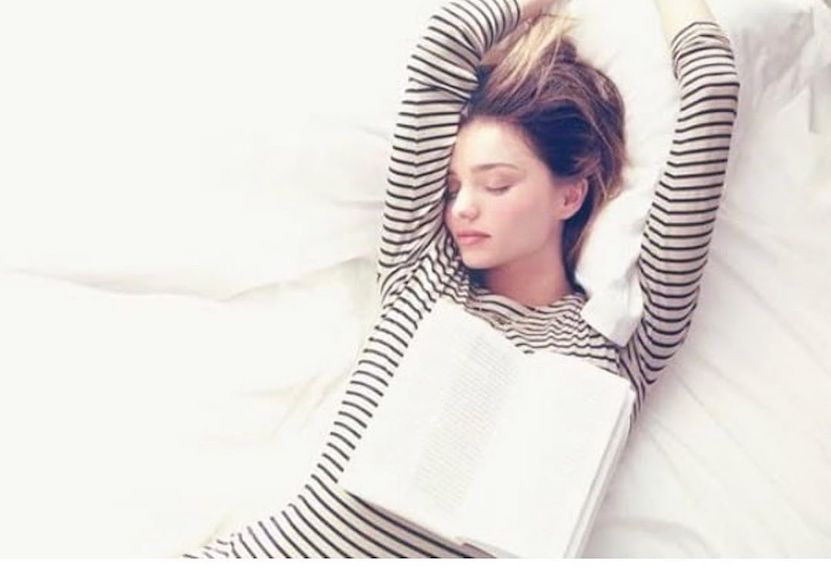 Miranda sleeping with a book