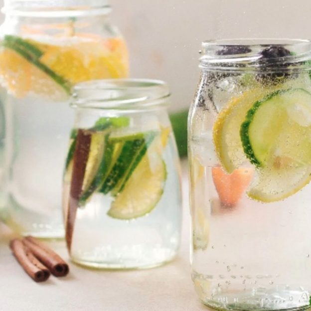 Jars of water with lemon and cucumber
