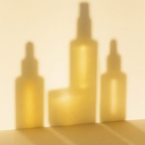 6 Winter Skin Care Tips for Glowing Skin shadow of skincare on wall